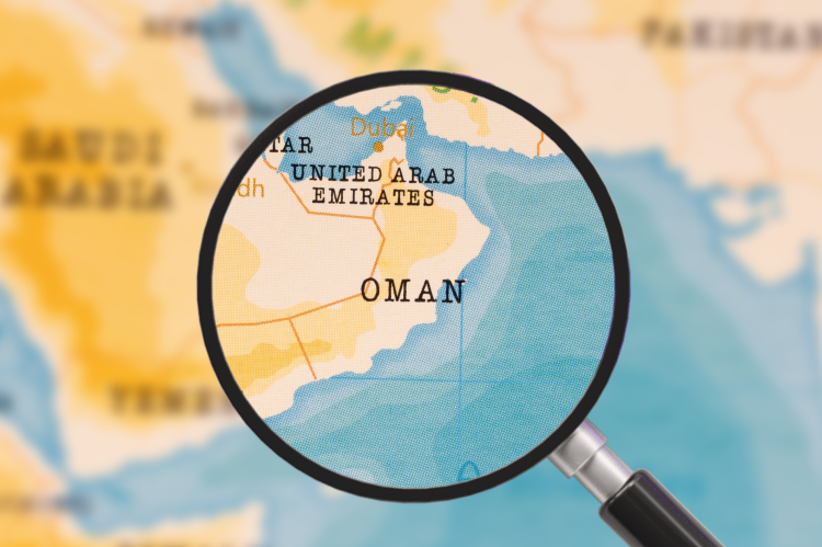 Oman on the map under the magnifying glas (© Shutterstock/hyotographics)