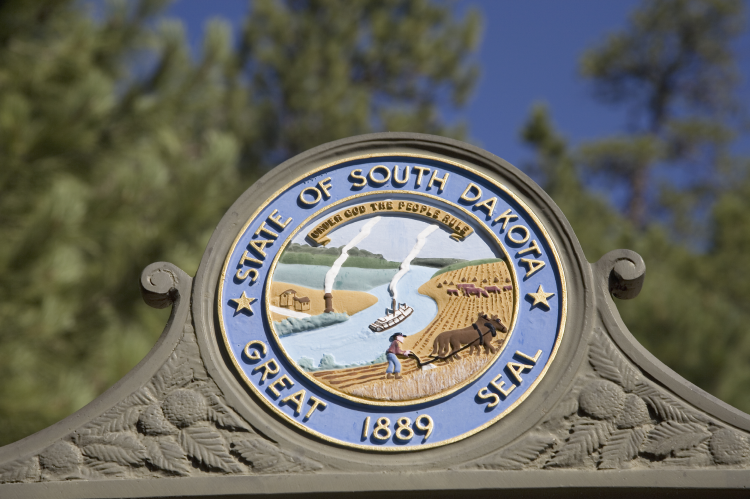 State Seal of the State of South Dakota, in the Black Hills, near Mount Rushmore National Memorial (© Shutterstock/Joseph Sohm) 