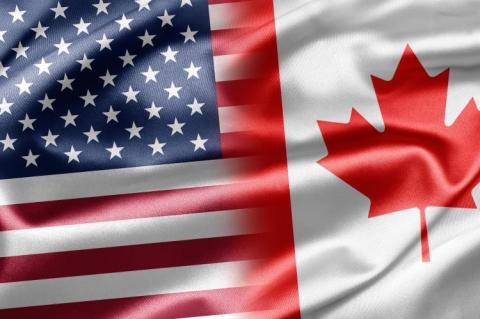 Flags of Canada and the USA (copyright by Shutterstock/ruskpp)