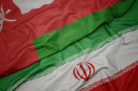 Flags of Oman and Iran (© Shutterstock/esfera)